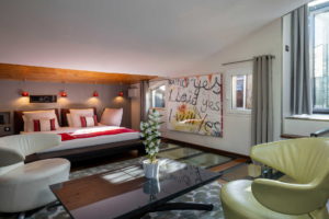 Grand lit avec petit salon - maison hote paris - Maison Lavaud  